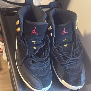 Jordan Black Sneakers with Gold and Red Details